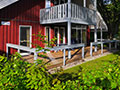 Ferienhaus 248 Holz Terrasse mit Gartenmöbeln